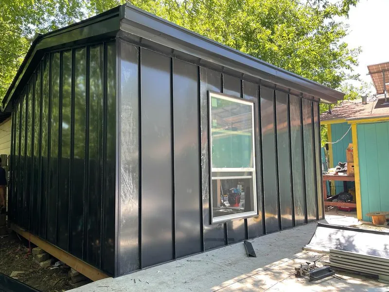 Black standing seam metal wall panels for Metal Roof Installation in East Lake