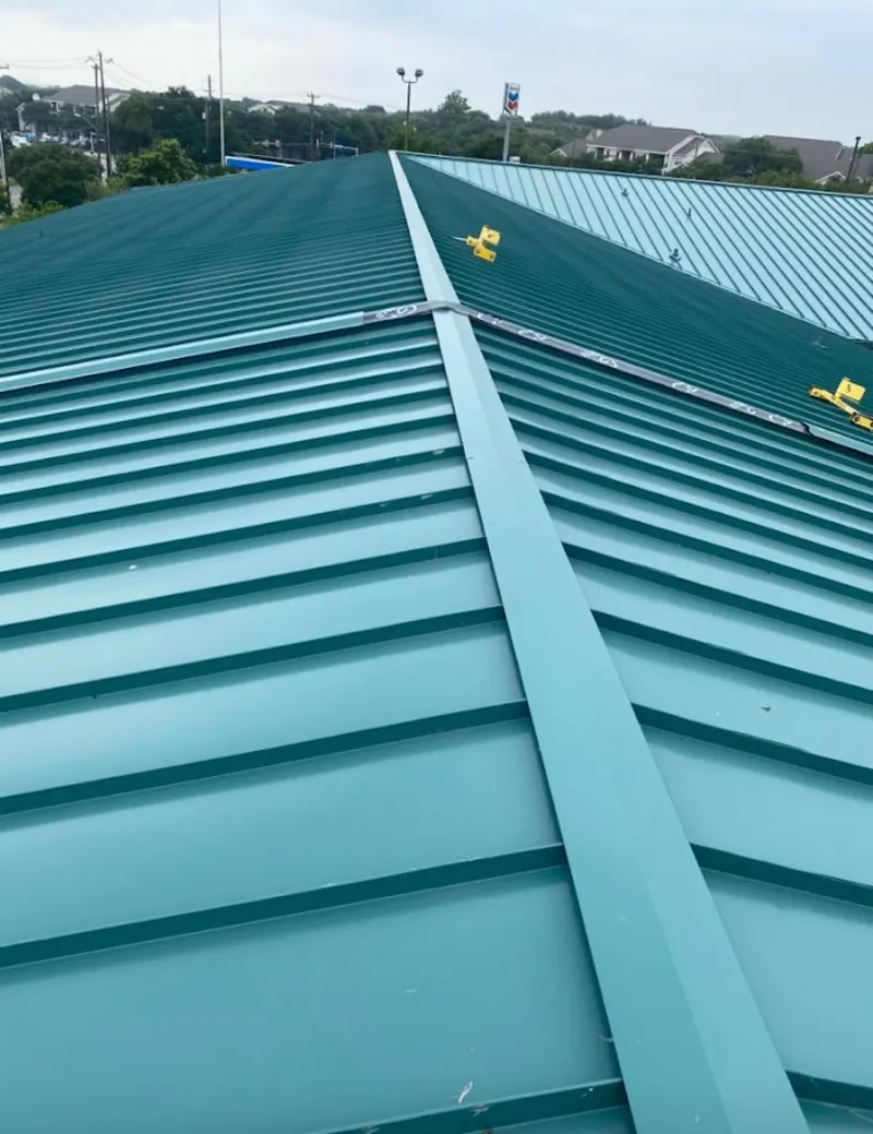 Green commercial metal roof ridge and valley for Metal Roof Repair in East Lake